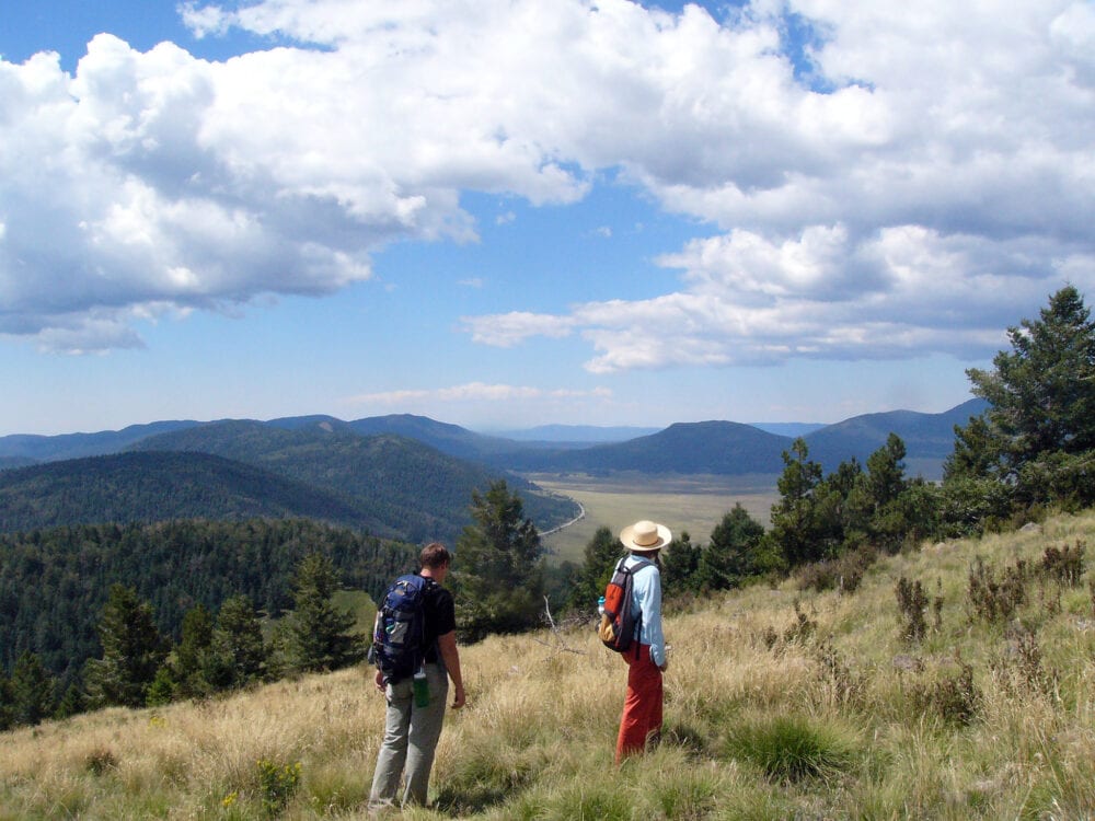 Hikers overlooking the Valles Caldera